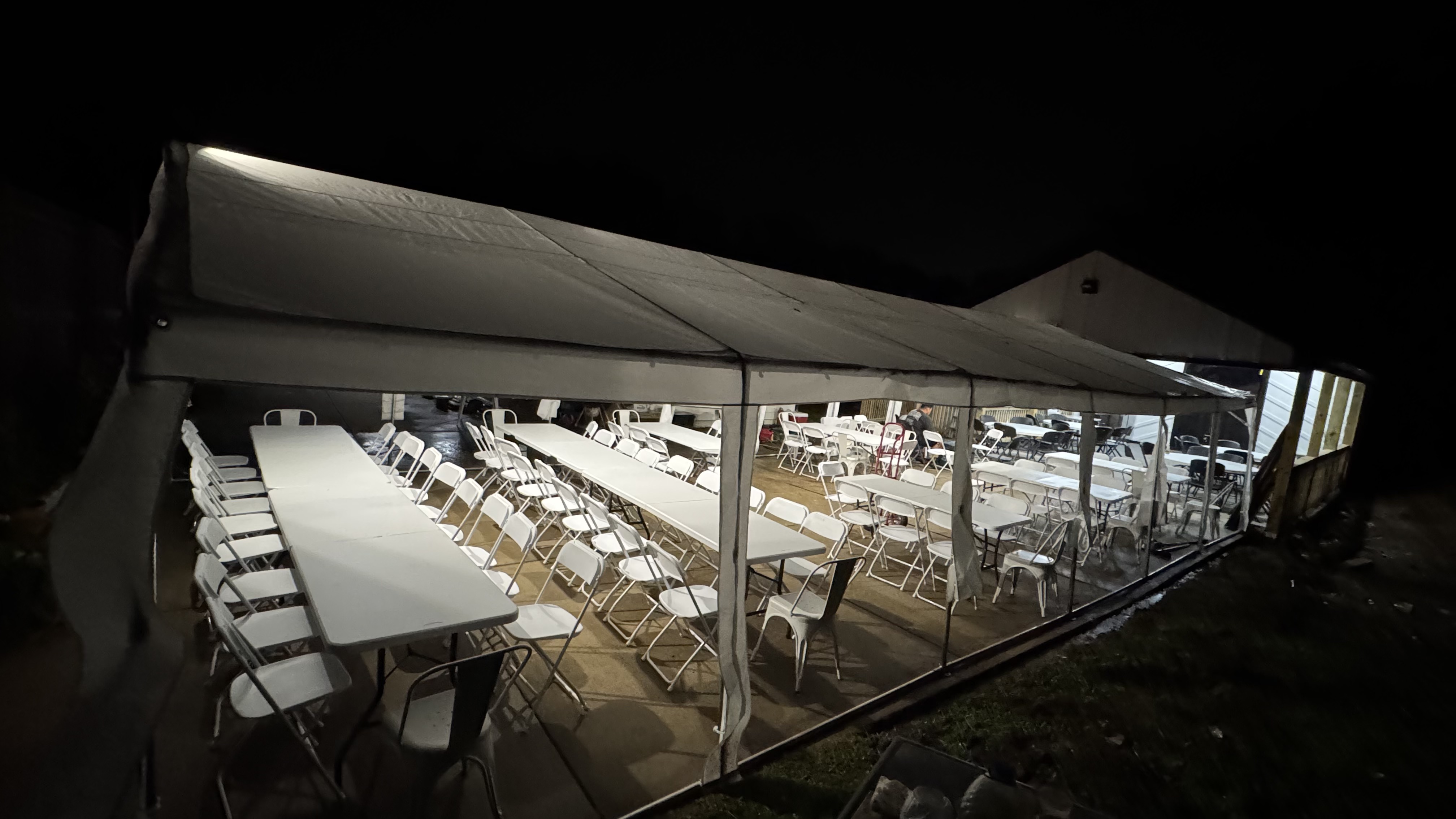 20x40 ft tent set up on a grassy field, perfect for large gatherings